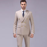 Beige slim-fit double-breasted suit with gold buttons, modern formal men&