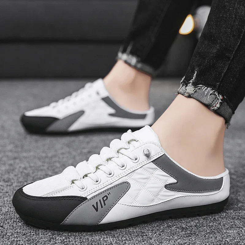 White and gray slip-on sneakers with quilted detail, black sole, low-cut fit