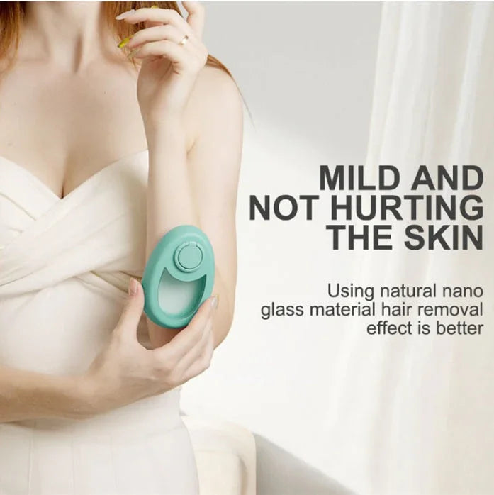 Woman in a white off-shoulder dress using a green nano glass hair removal device on her arm