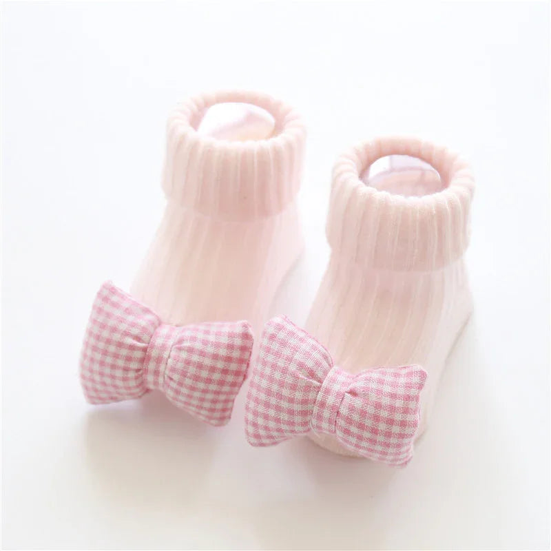 Soft pink ribbed baby socks with checkered pink bows, cotton, cozy fit, cute style