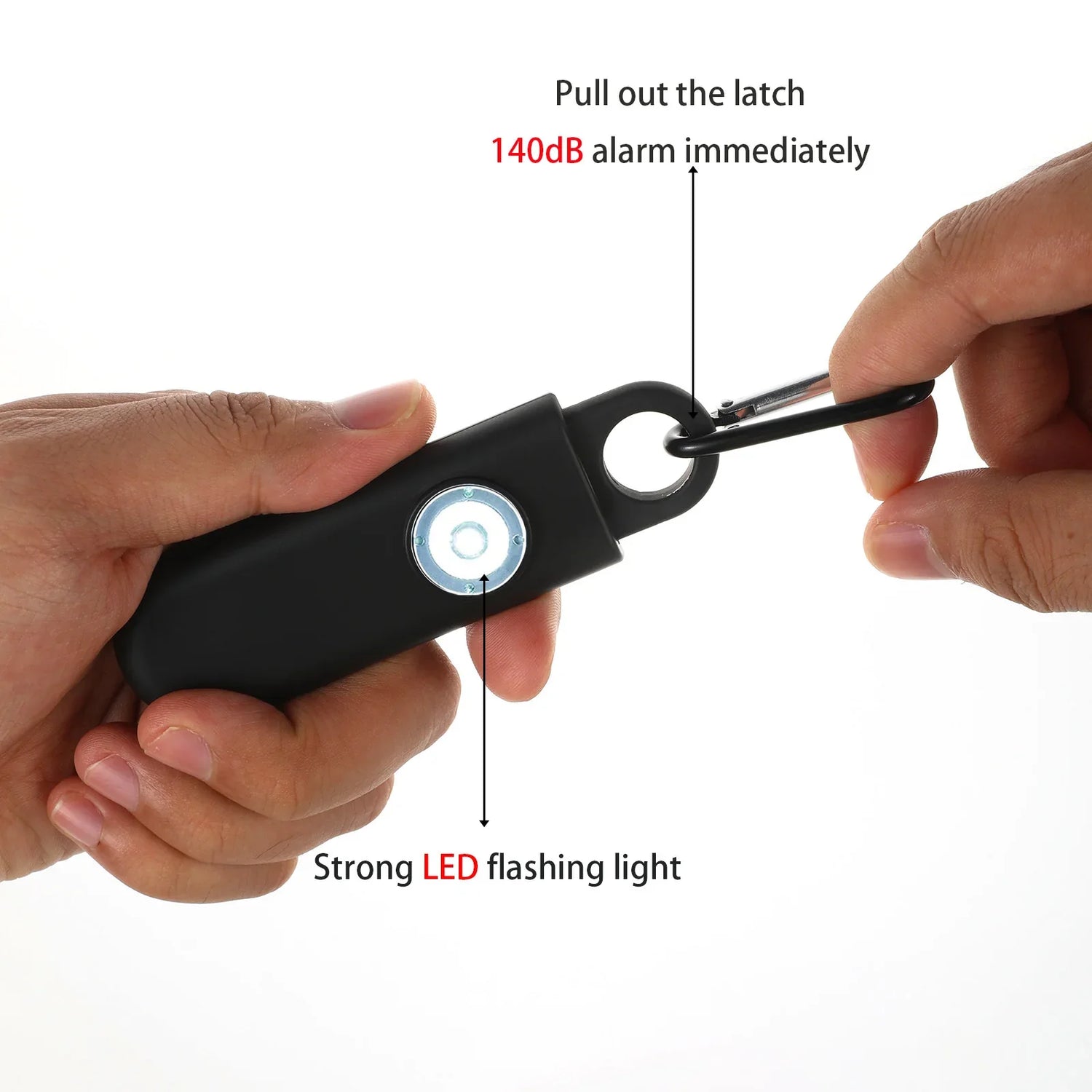 Black personal safety alarm with LED light, compact design, attached to keyring in hand
