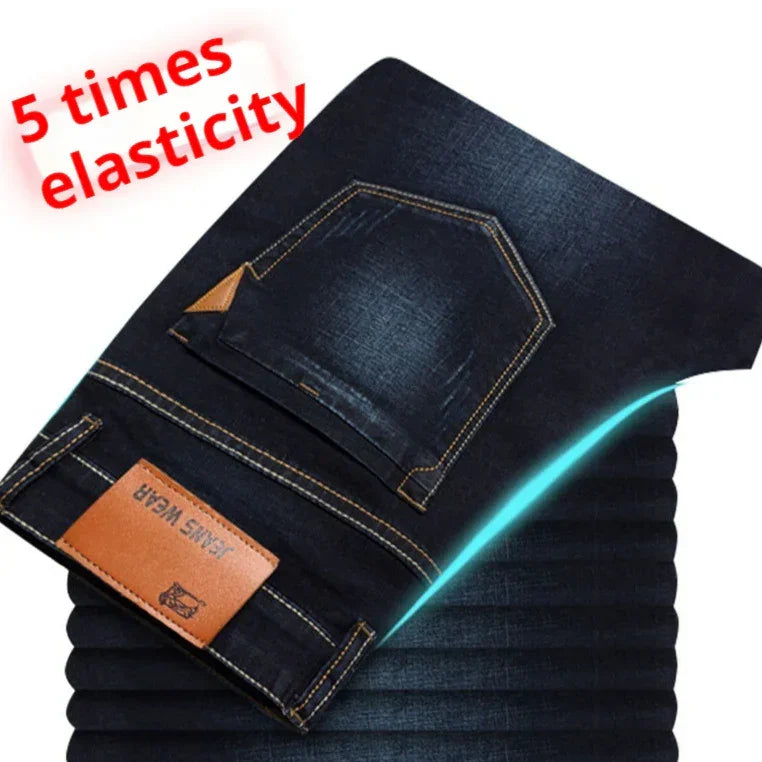 Dark blue stretch denim jeans with five times elasticity, slim fit design, and contrast stitching.