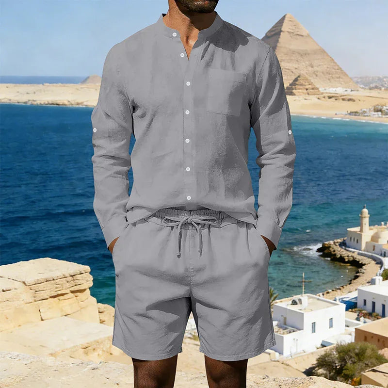 Man wearing light grey linen long sleeve shirt and drawstring shorts set, relaxed fit