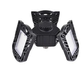 Adjustable black LED garage light with three foldable panels, modern industrial design