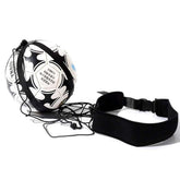 Black and white floral soccer ball with adjustable training belt and cord, isolated on white