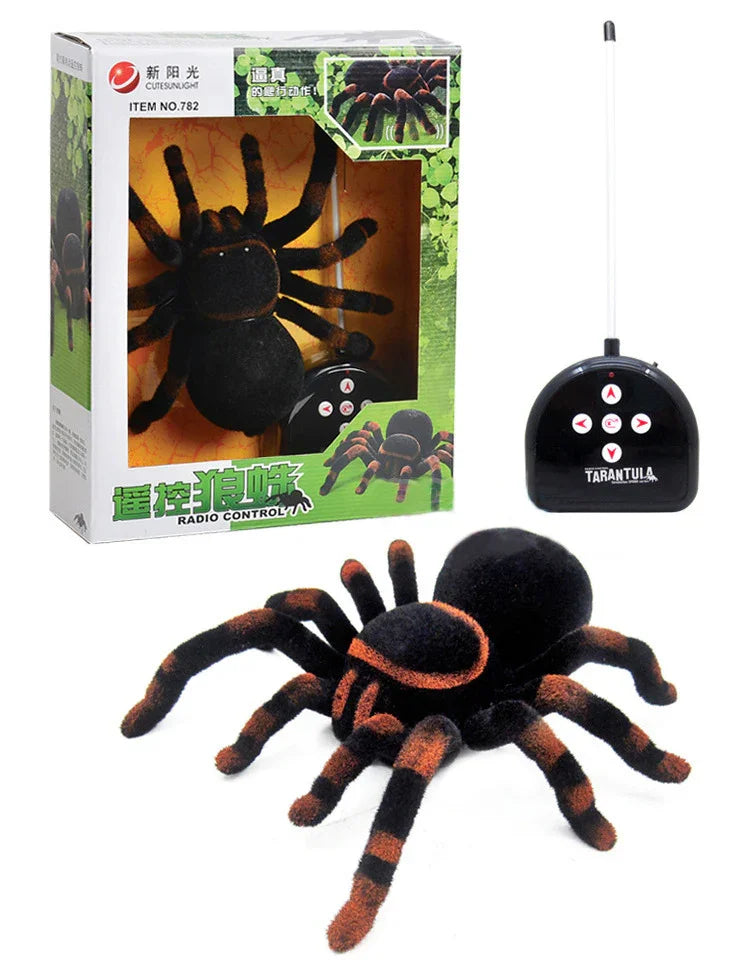 Remote control black and orange tarantula toy with furry texture and wireless controller