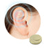 Gold magnetic ear stud on ear, metallic finish, minimalistic non-piercing accessory.