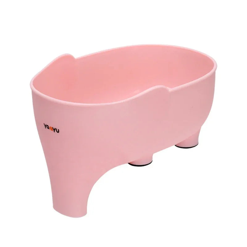 Light pink plastic container with rounded edges and small legs, minimalist style