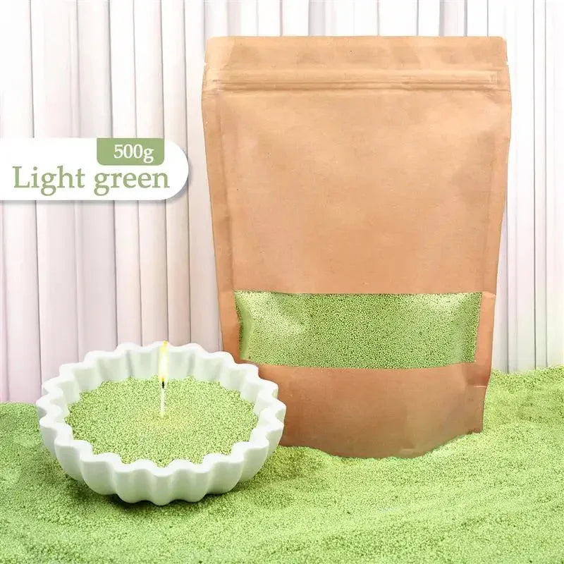 Light green decorative sand in kraft pouch with sample in white scalloped dish