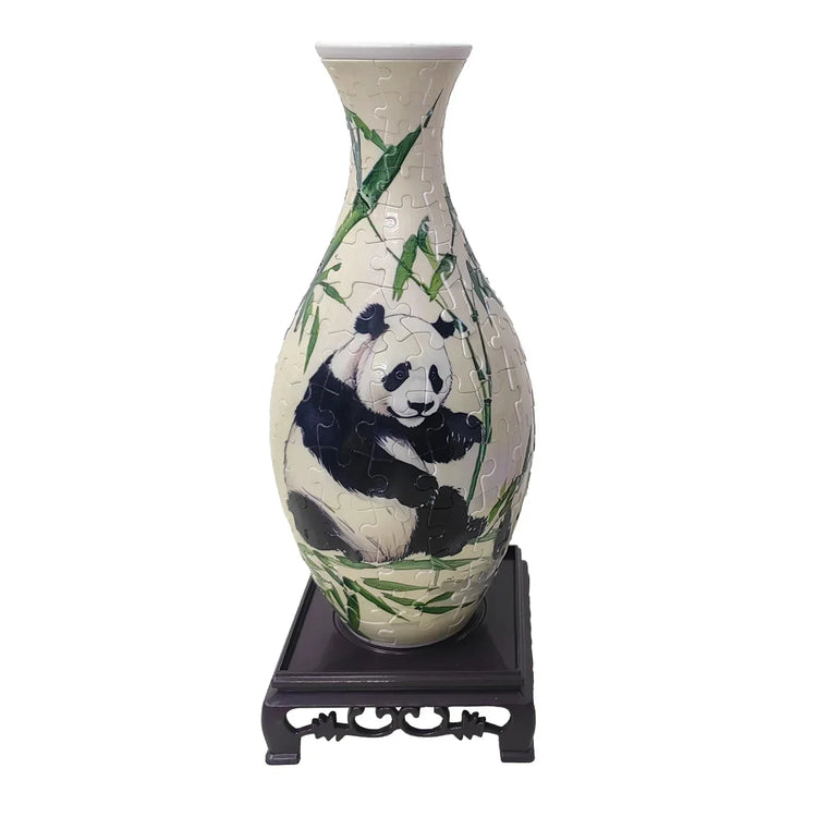Ceramic vase-shaped puzzle featuring a panda and bamboo, displayed on a decorative wooden stand.