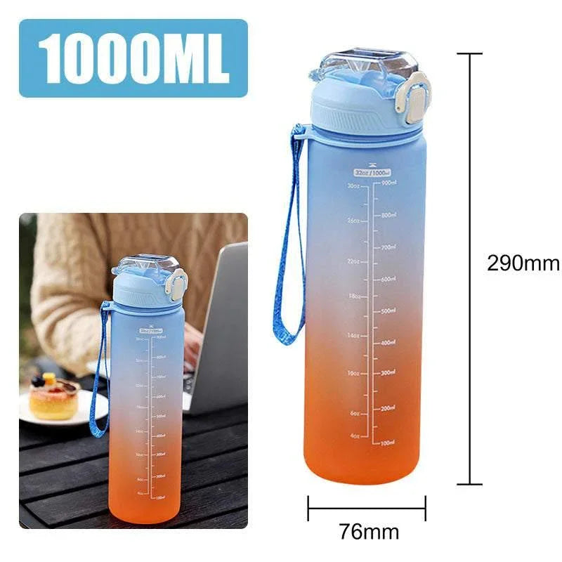Gradient blue and orange 1000ml water bottle with leak-proof flip lid, measurement markings, and carrying strap.