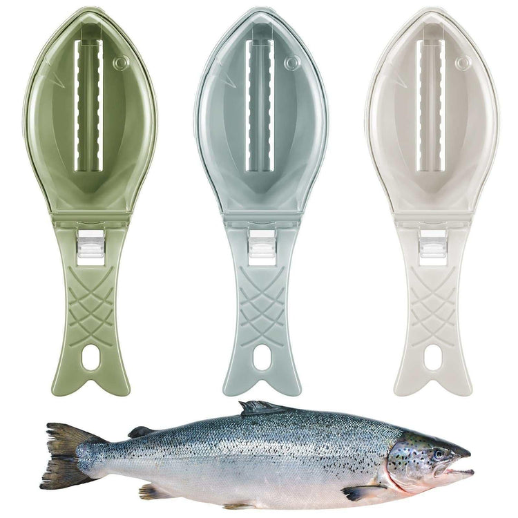 Three plastic fish-shaped fish scalers in green, blue, and white above a fresh fish.