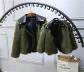 Olive green faux fur jackets with black faux leather collars, relaxed fit, hanging on rack