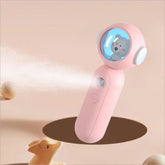 Pink handheld mini fan and mister with cute bear design and soft matte finish