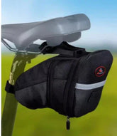Black bike saddle bag with reflective strip, durable fabric and zip closure, mounted under seat