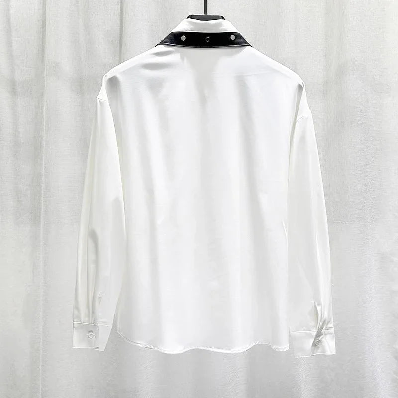 White long sleeve shirt with black snap collar, relaxed fit, satin-like fabric