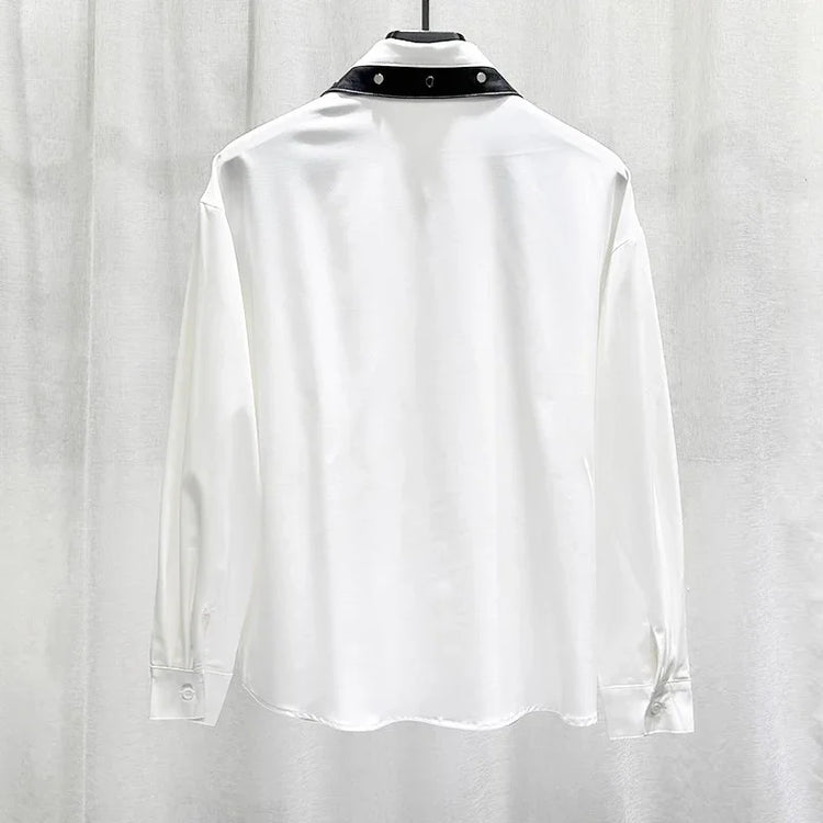 White long sleeve shirt with black snap collar, relaxed fit, satin-like fabric