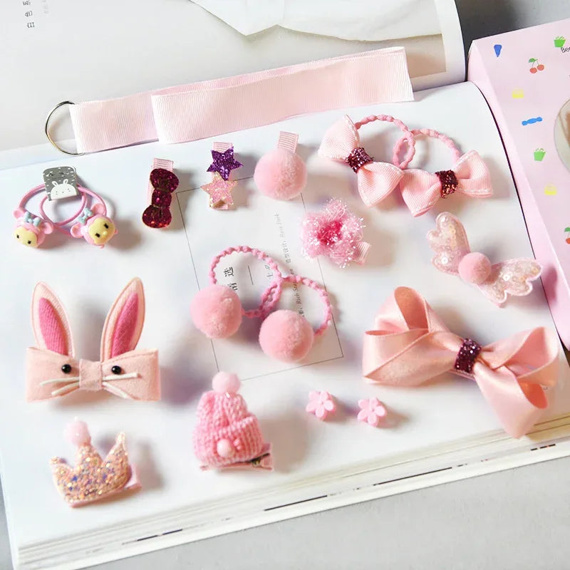 Assorted pink hair accessories and clips with bows, pompoms, and glitter accents.