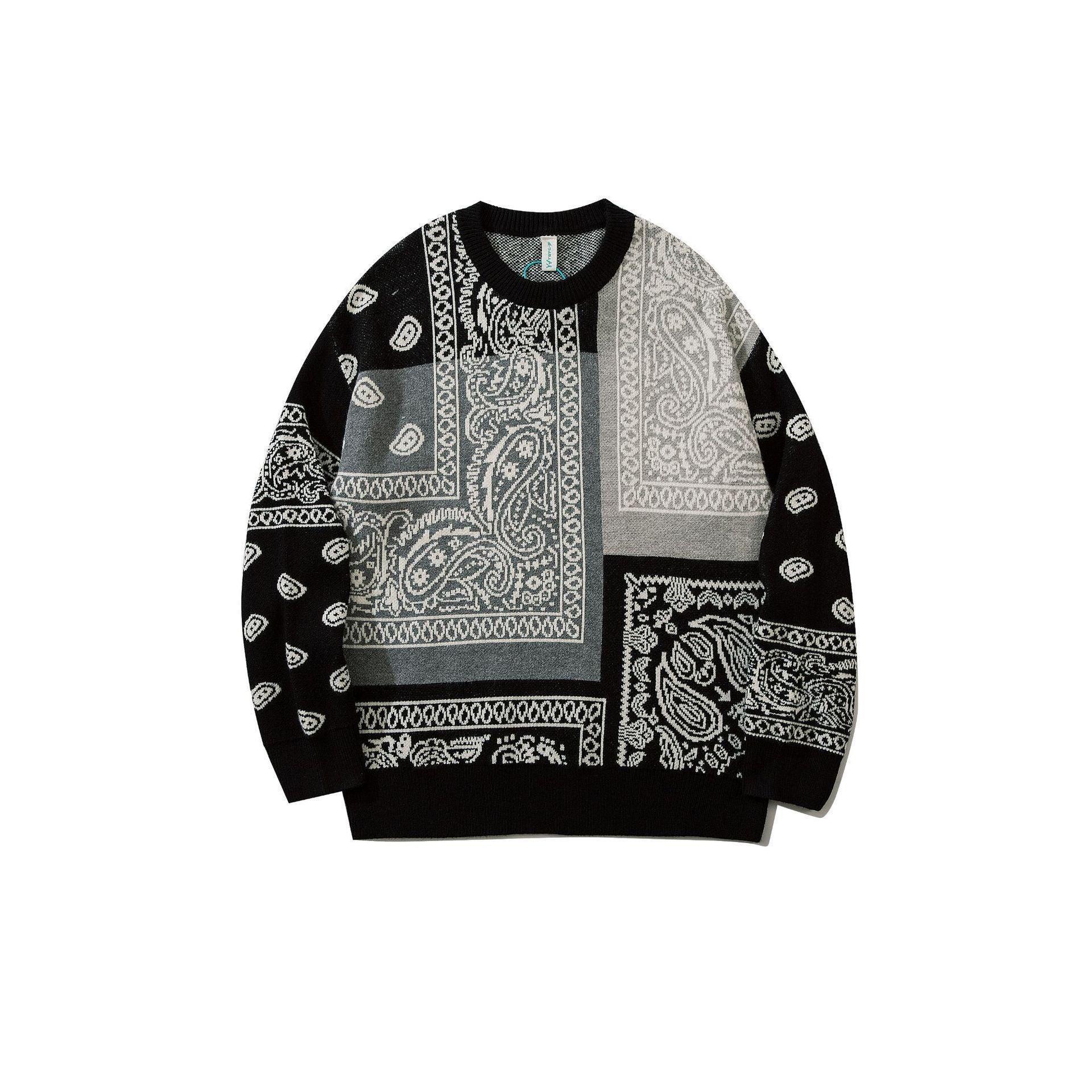 Black and grey oversized crewneck sweater with paisley and bandana print, streetwear style.