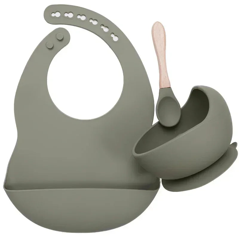 Olive green silicone baby bib, suction bowl, and spoon set with modern design