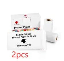 Two rolls of white thermal sticker printer paper with packaging, labeled for 10-year durability