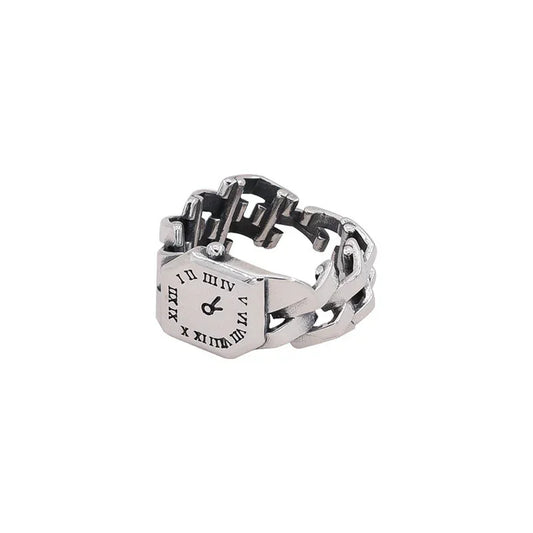 Chunky silver chain ring with Roman numeral watch face, edgy streetwear accessory.