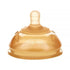 Brown silicone baby bottle nipple with rounded tip and soft material, isolated on white
