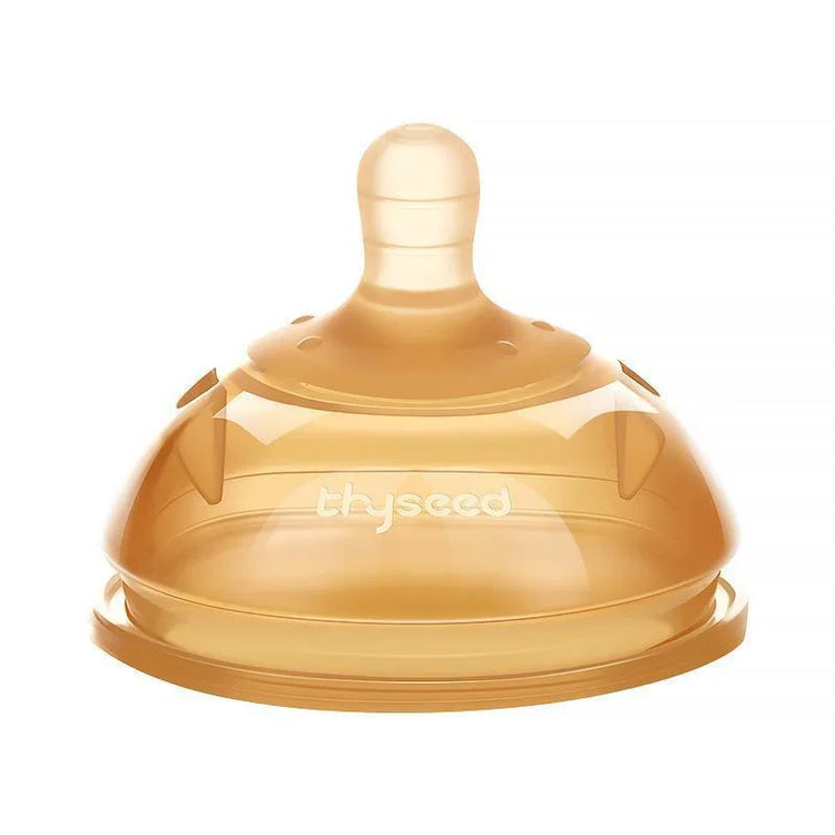 Brown silicone baby bottle nipple with rounded tip and soft material, isolated on white
