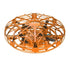 Futuristic orange drone with cage-like metal frame and compact propellers