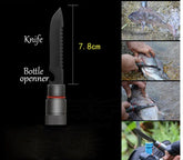 Compact black survival knife with serrated edge and bottle opener, 7.8cm, used for fishing and outdoor tasks.