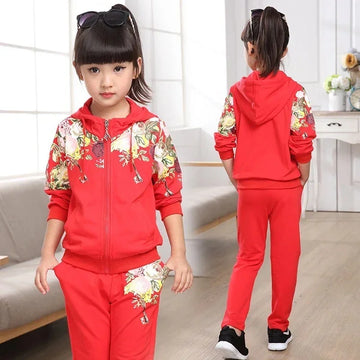 Girl wearing red floral hoodie and jogger pants set, casual fit, cotton material