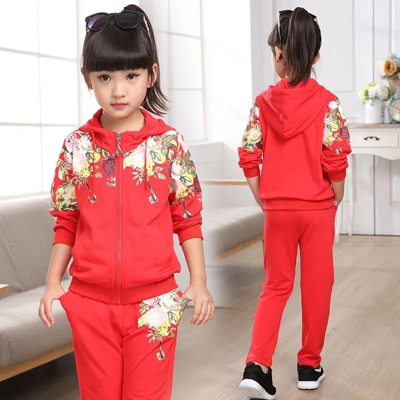 Girl wearing red floral print hoodie and jogger set, casual fit, soft material