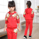 Girl wearing red floral print hoodie and jogger set, casual fit, soft material