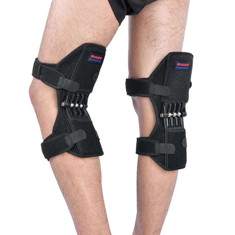 Adjustable black knee support braces with springs, worn for joint protection and ergonomic fit