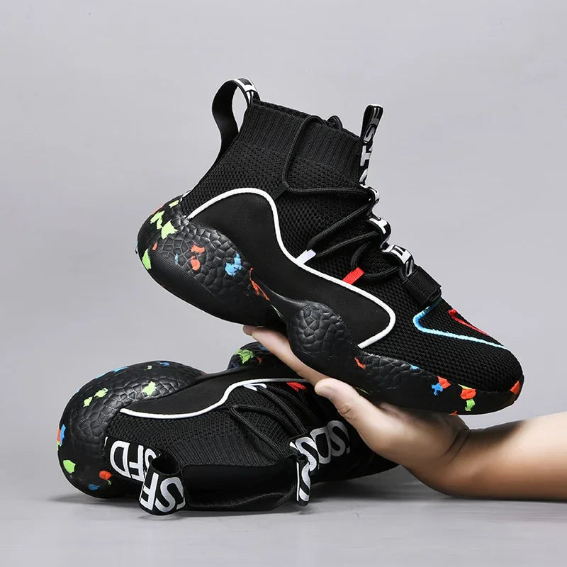 Black high-top sneakers with mesh knit material, colorful chunky sole, modern streetwear style
