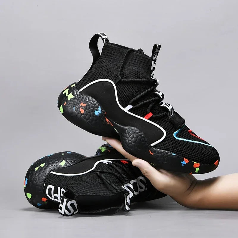 Black high-top sneakers with mesh knit material, colorful chunky sole, modern streetwear style