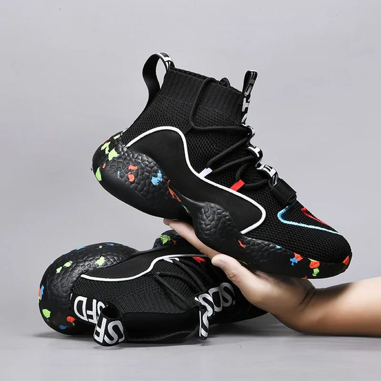Black high-top sneakers with mesh knit material, colorful chunky sole, modern streetwear style