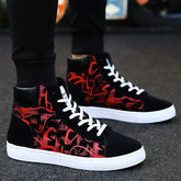 Black high-top sneakers with red graffiti design, white soles, and white laces