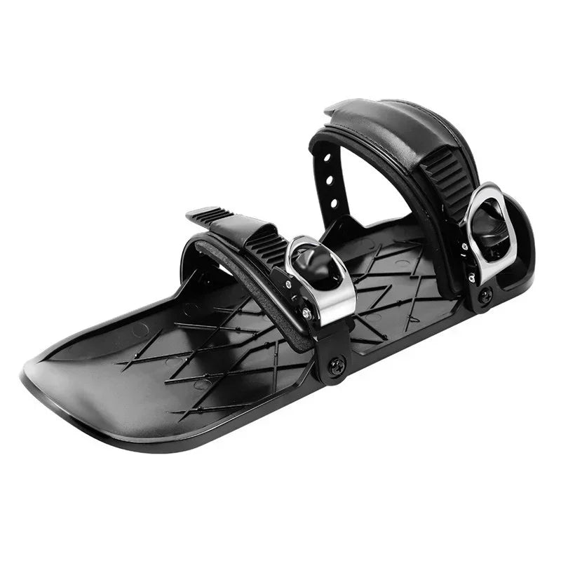 Black adjustable plastic snow shoe plate with dual foot straps and textured sole