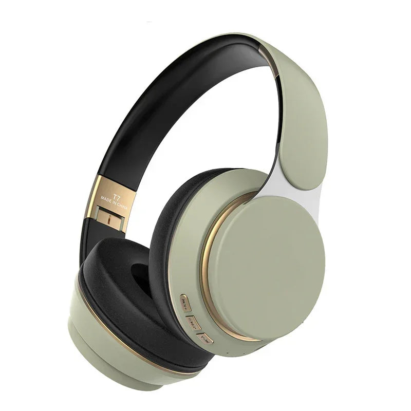 Matte olive green over-ear wireless headphones with gold trim and cushioned black ear pads