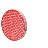 Round red LED therapy light panel with multiple bulbs, modern tech accessory