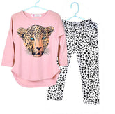 Pink long sleeve top with leopard face print and black and white leopard print leggings set