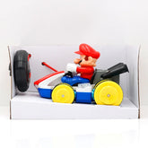 Red and blue plastic toy car with yellow wheels and handheld remote controller