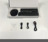 Black detachable Bluetooth speaker set with accessories, user manual, and cables on white background