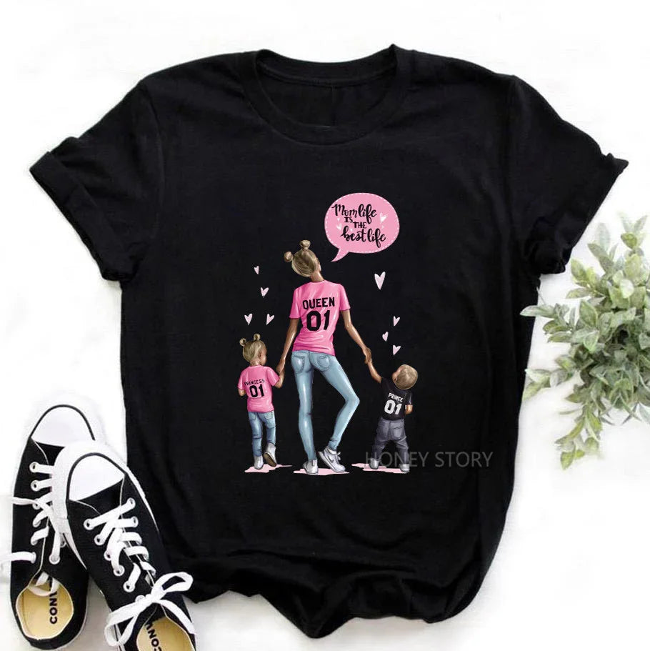 Black t-shirt with graphic of mom and kids in pink tops and jeans, casual streetwear style.