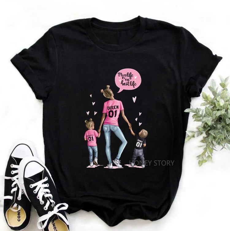 Black t-shirt with graphic of mom and kids in pink tops and jeans, casual streetwear style.