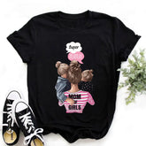 Black cotton t-shirt with cartoon graphic, pink and white accents, relaxed fit, mom and daughters design.