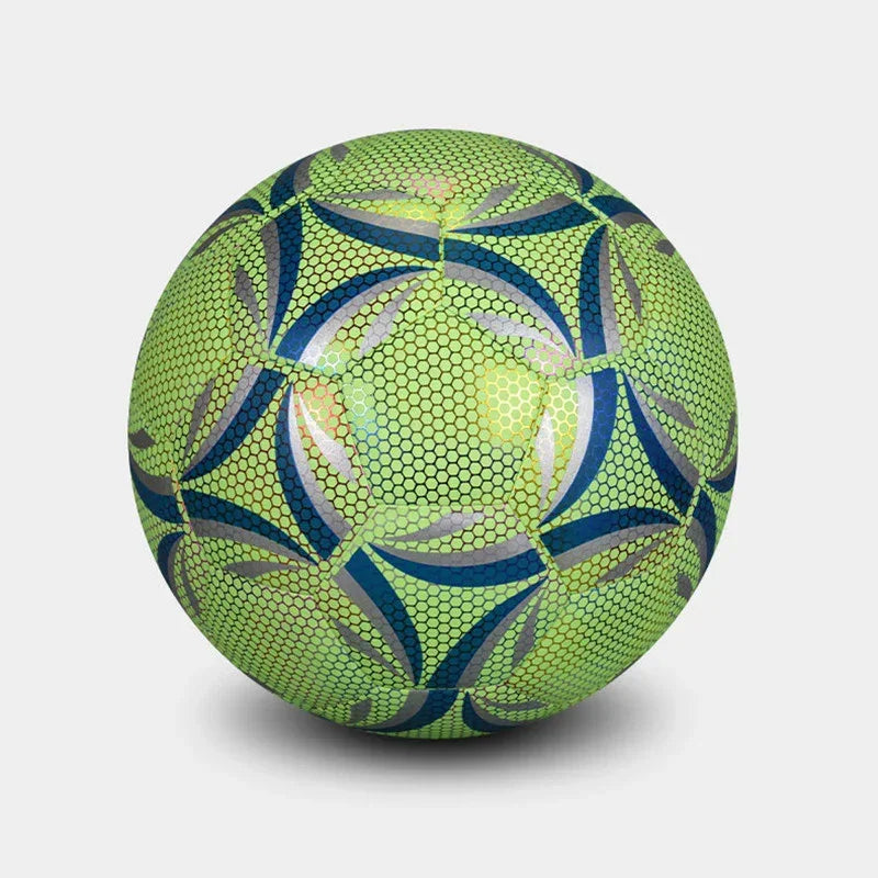 Green and blue patterned soccer ball with a honeycomb texture on a plain background