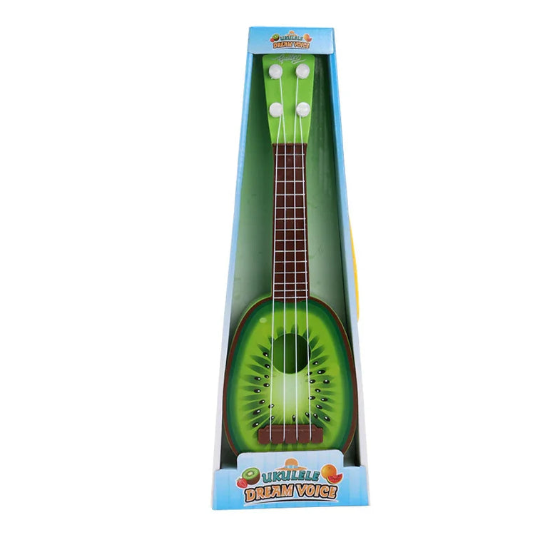 Toy ukulele with a kiwi fruit design, green body, four white tuning pegs, in retail packaging