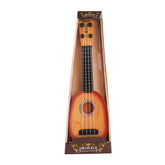 Wooden ukulele with sunburst finish, black fretboard, and four strings in display packaging